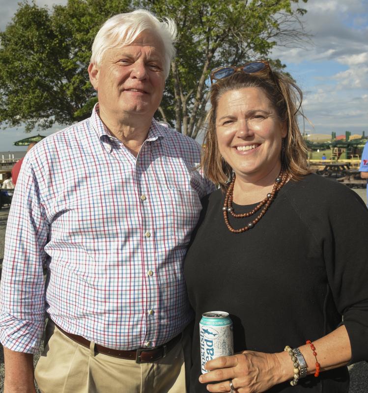 Mayor Ted Becker and Vice President and Owner of Dogfish Head Craft and Brewery Mariah Calagione, share a moment on the Off Centered patio.